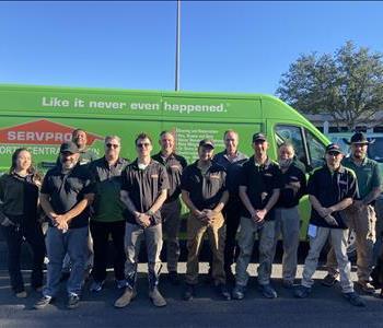 Team Photo 2021 in front of green SERVPRO vehicle